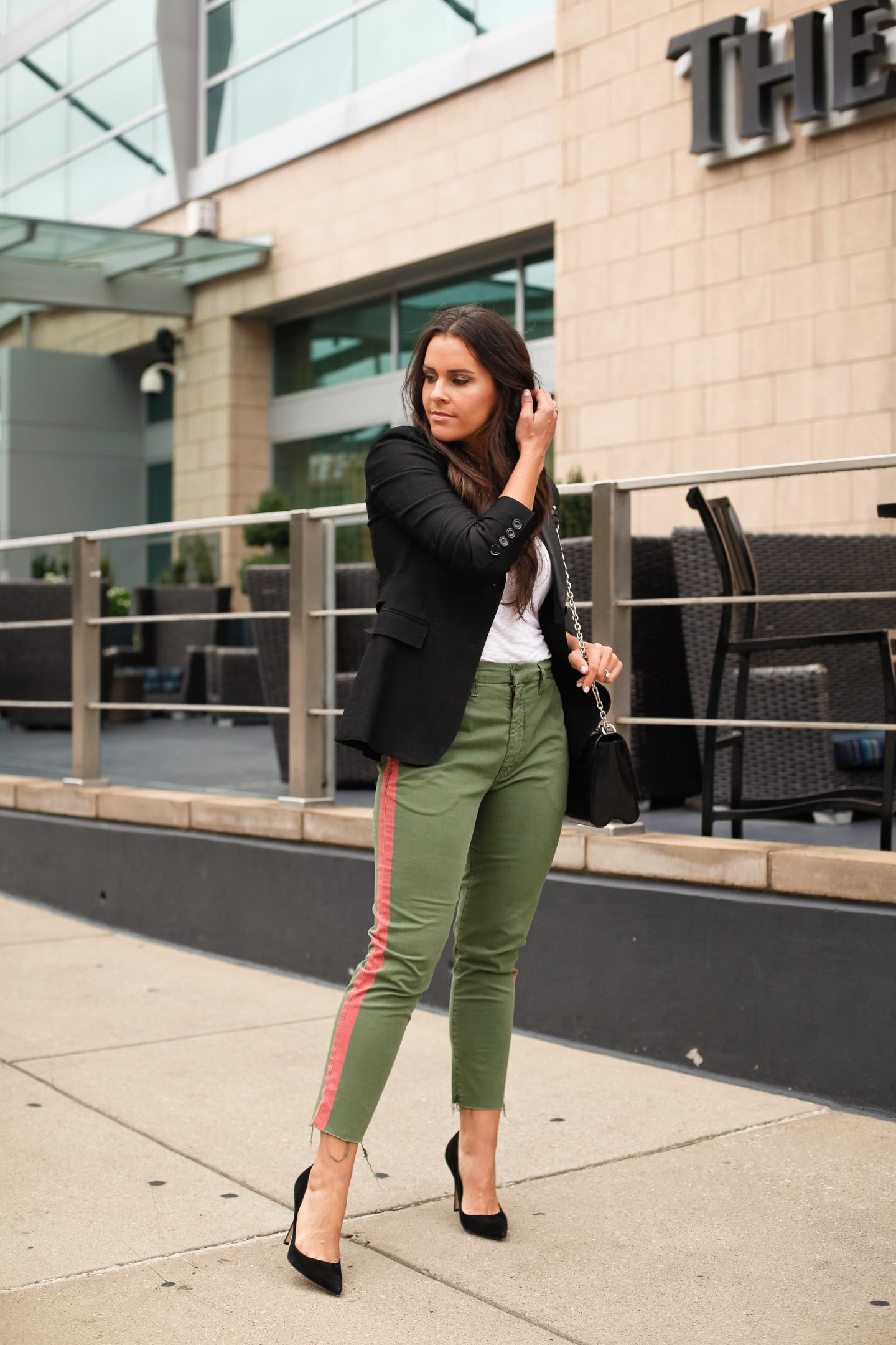 black jacket green pants